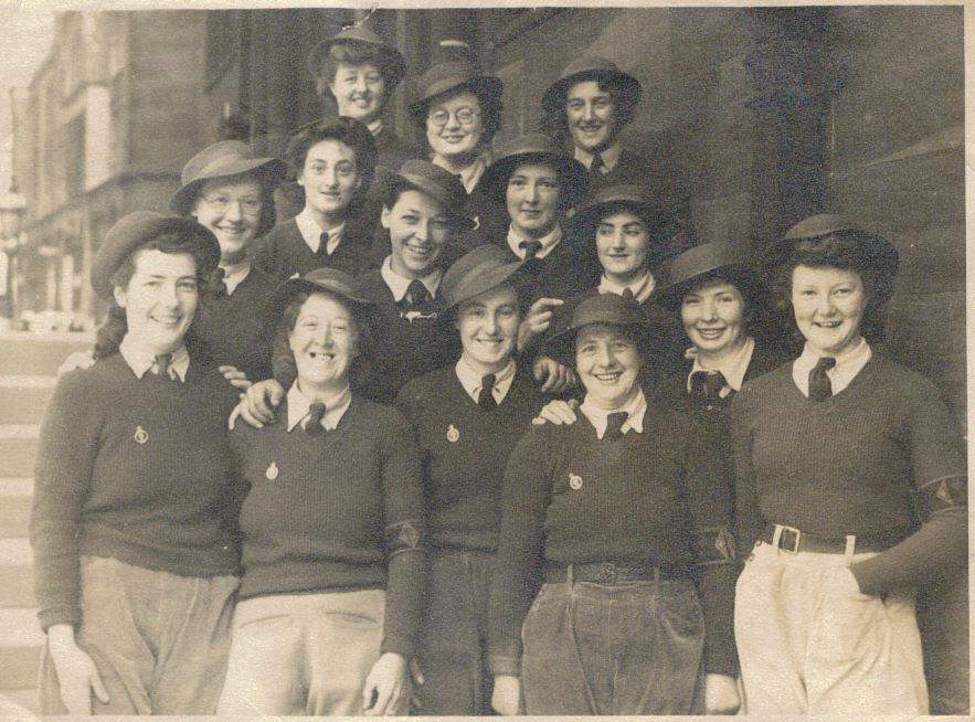 Jeanne Flann with other Land Girls outside Mansion House in 1944 after being presented to the Queen for her service to the war effort.